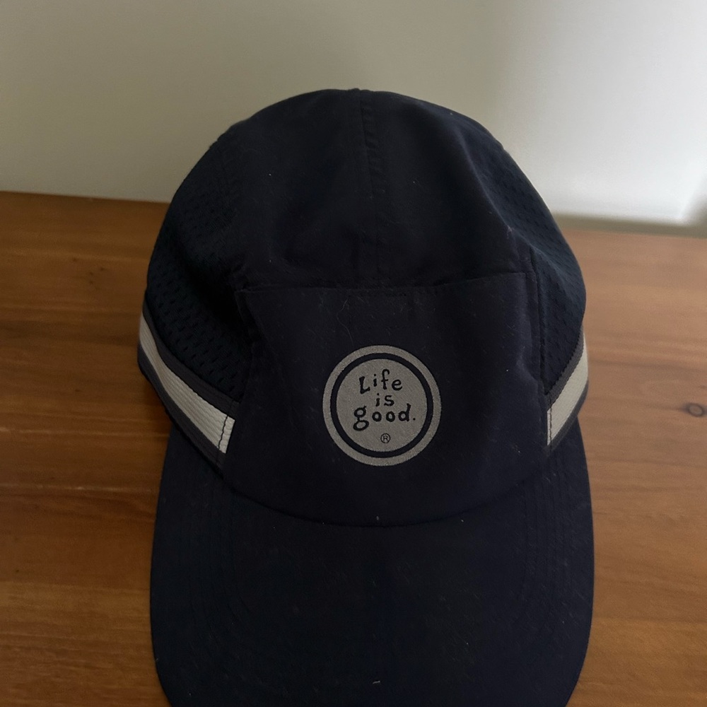 Life is good adjustable ball cap.   Navy blue unisex